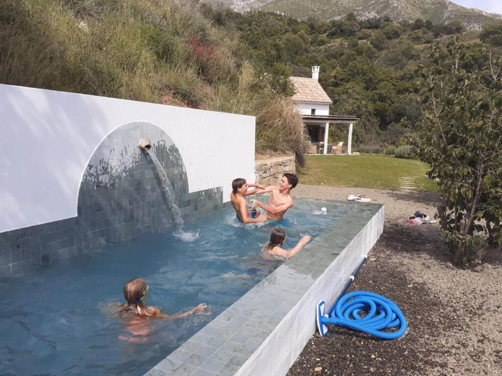 Private swimming pool with waterfall feature – Finca Vista Lago Istán