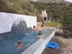 Private swimming pool with waterfall feature – Finca Vista Lago Istán