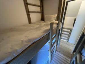 Close-up of wooden bunk beds – Finca Vista Lago Istán