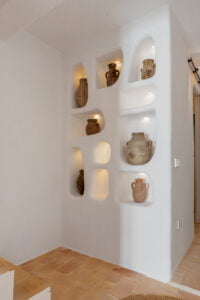 Whitewashed wall with decorative niches at Casa Aduar 22 Marbella Old Town