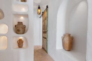Whitewashed wall with decorative niches at Casa Aduar 22 Marbella Old Town