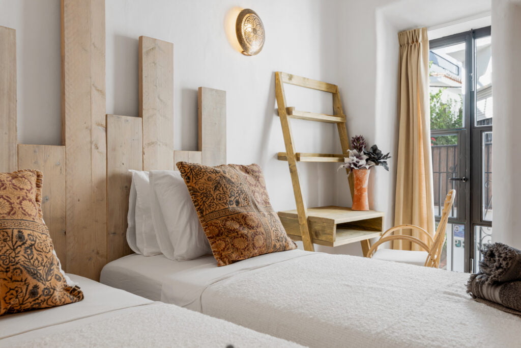 Twin bedroom with ladder decor at Casa Aduar 22 Marbella Old Town