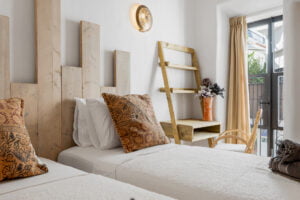 Twin bedroom with ladder decor at Casa Aduar 22 Marbella Old Town