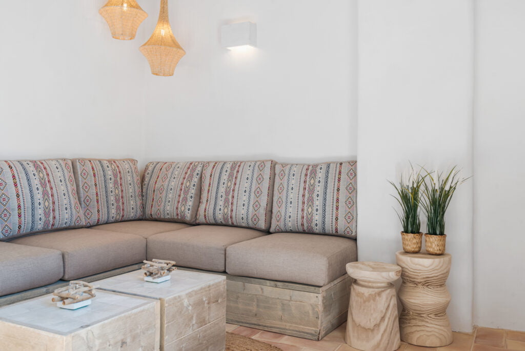 Living room with sofa and rustic style at Casa Aduar 22 Marbella