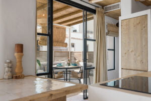 Open-plan living room and kitchen at Casa Aduar 22 Marbella Old Town