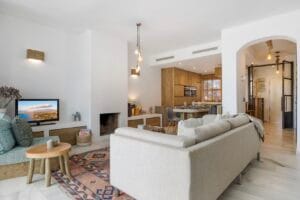 Spacious living room with sofa and open-plan layout – Jardín de los Pinos Marbella