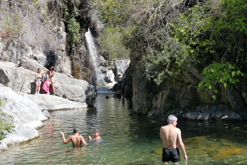 Charco del Canalón waterfall near Istán with natural pool in the mountains above Marbella