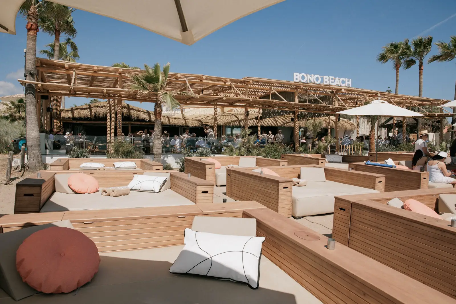 Bono Beach Marbella beach club with sunbeds lounge beds and beachfront restaurant