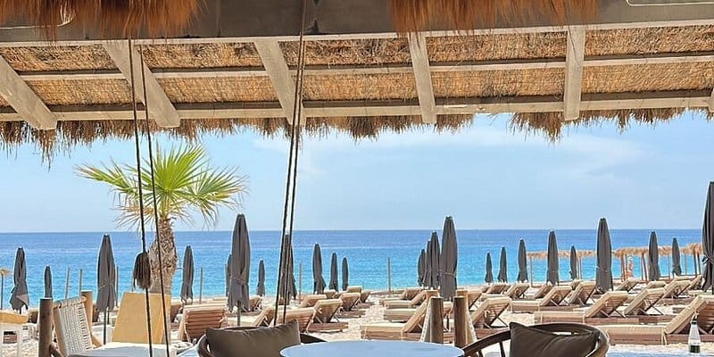 Luuma Beach Marbella beach club with sunbeds umbrellas and sea view terrace